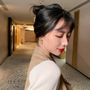vol Earrings