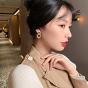 vol Earrings